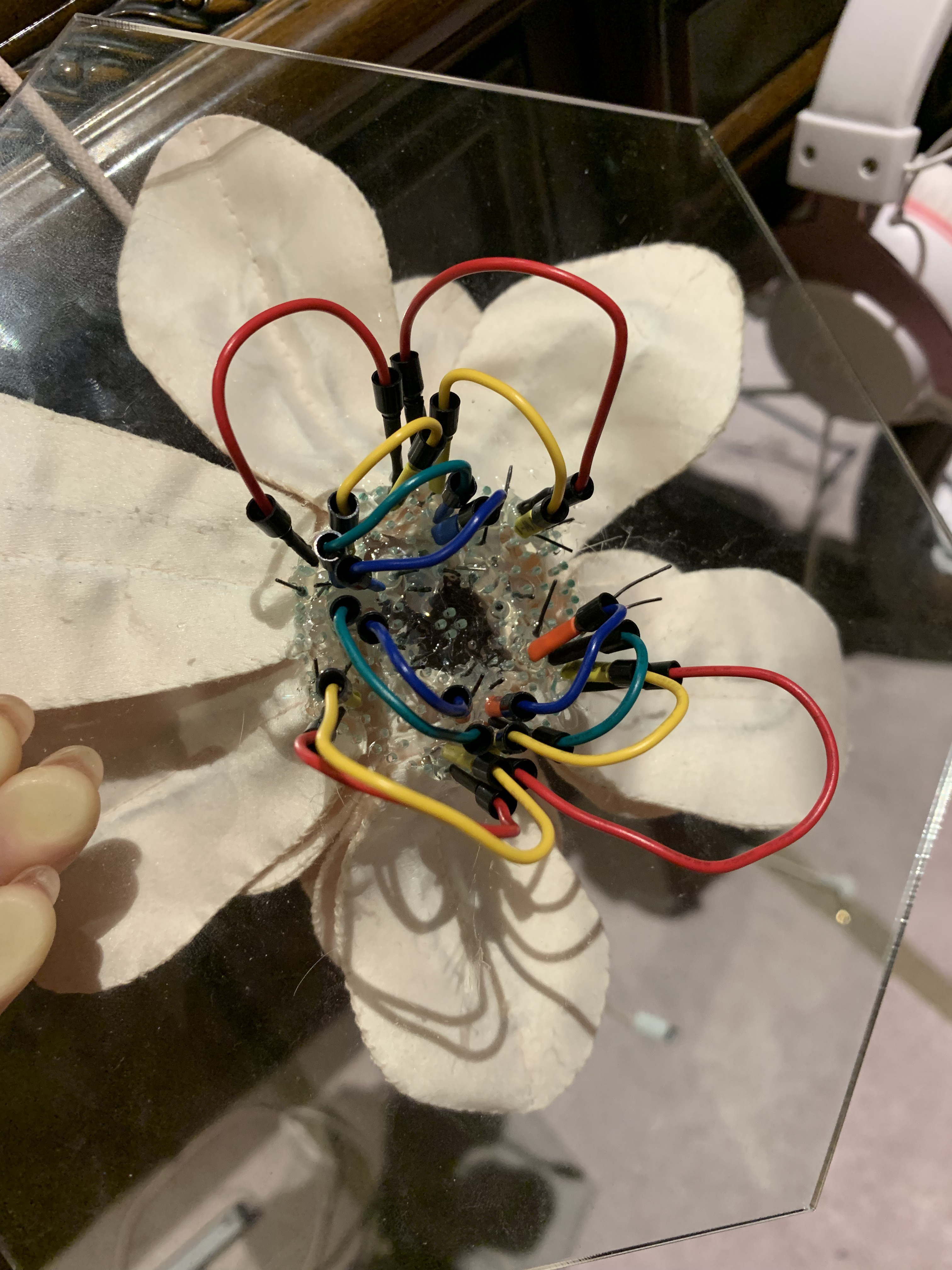 Locked Lotus wiring — flower with electronics under hexagonal sheet